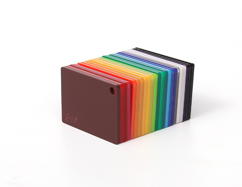 Acrylic colour samples used as one visible input in a polycarbonate versus acrylic review