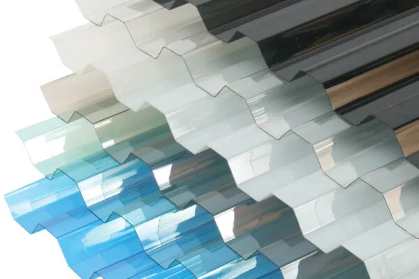 Fanned clear, blue, grey and bronze corrugated polycarbonate sheet samples