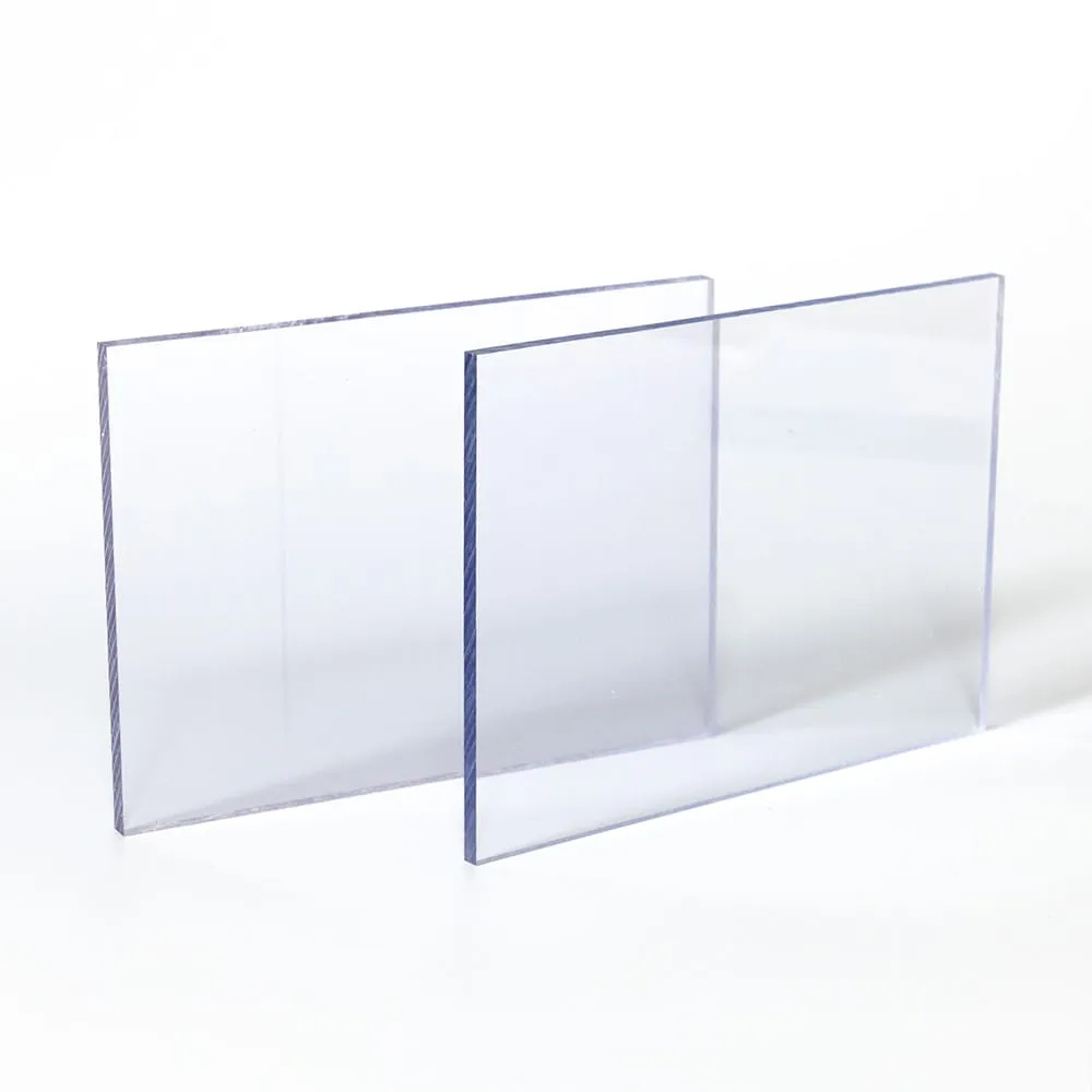Two clear polycarbonate sheet samples overlapping on a white background